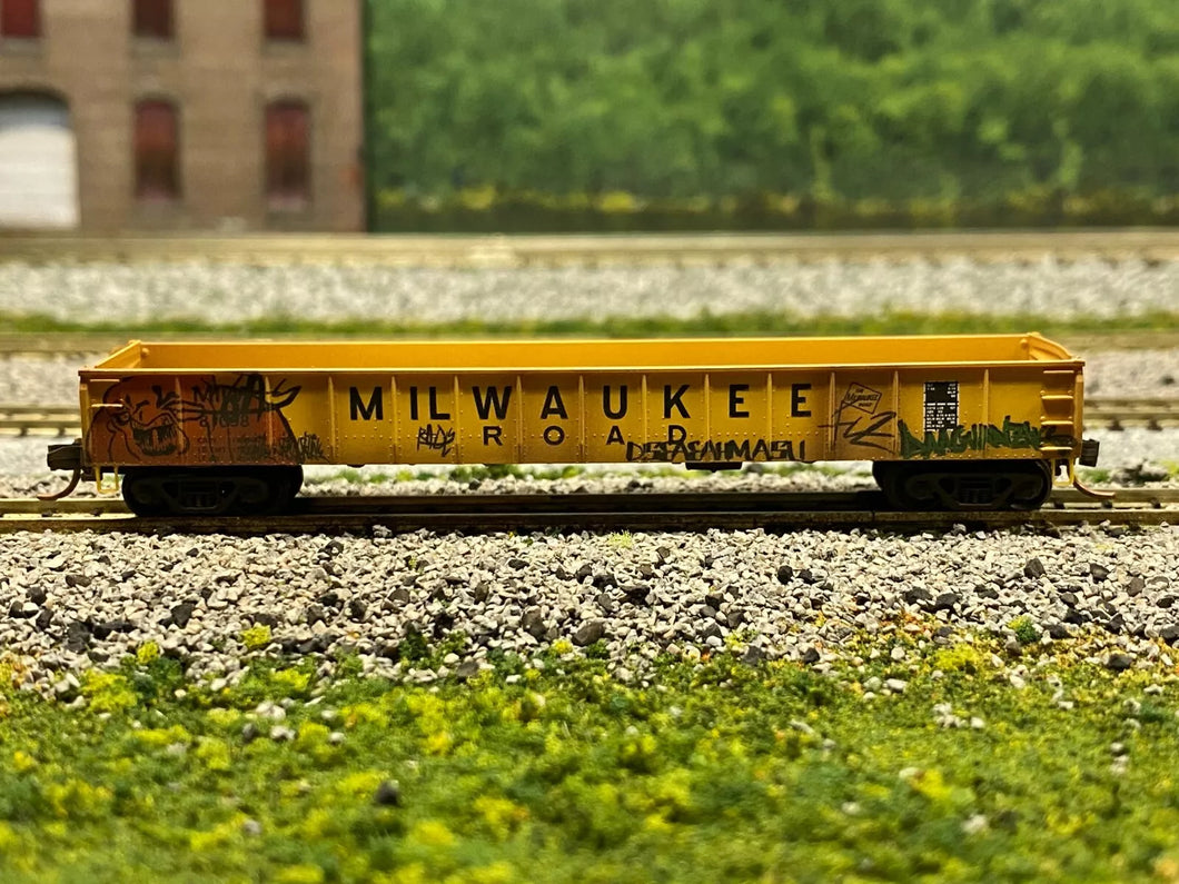 N Scale - MTL 04844110 Milwaukee Road 50' Drop End Gondola (Factory Weathered) N3785